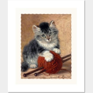 Kitten with a ball of wool Posters and Art